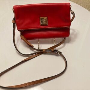 Dooney and Bourke red fold over Crossbody bag